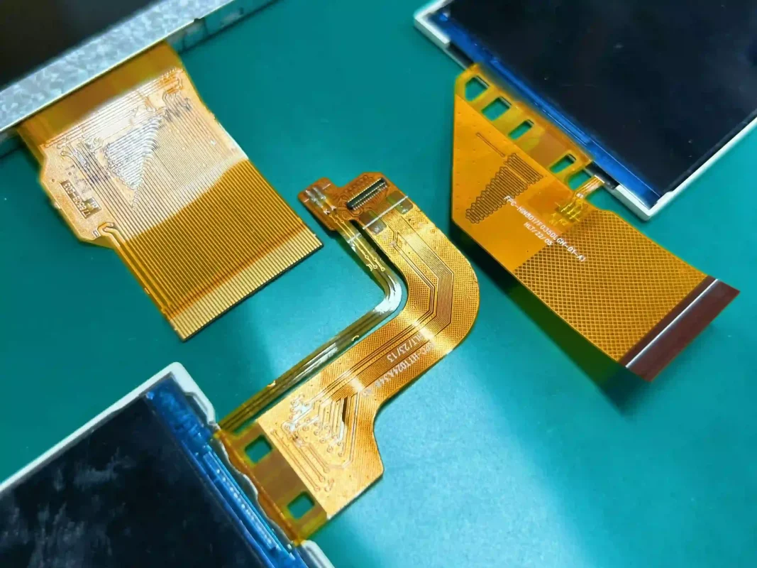 Flexible printed cables attached to LCD display modules